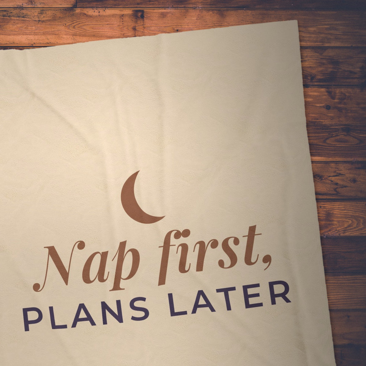 Nap First Plans Later blanket on the floor