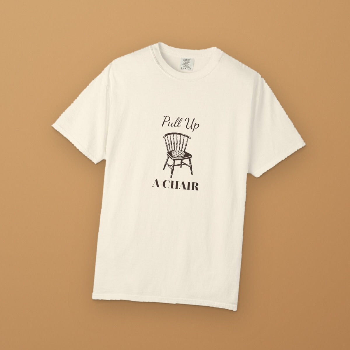 Pull Up a Chair Thanksgiving tee - styled flat marigold clay