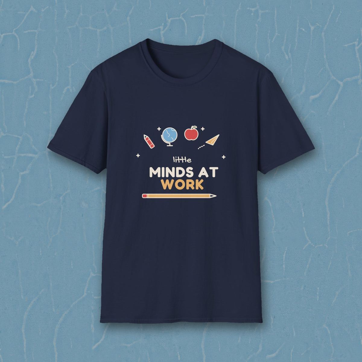 Little Minds at Work tee - styled blue plaster wall